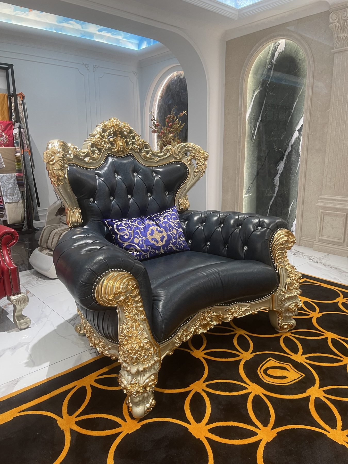 Ornate classic carved sofa in a Foshan furniture showroom