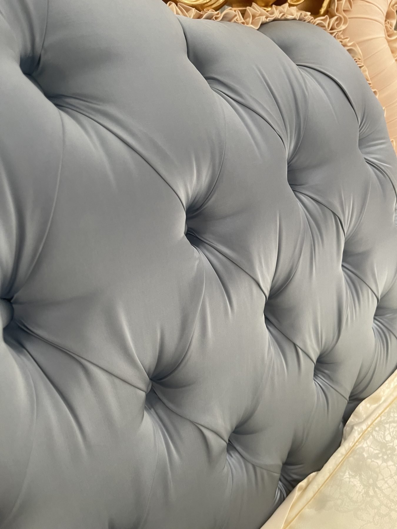 Hand-carved wood detail on classic furniture in Foshan