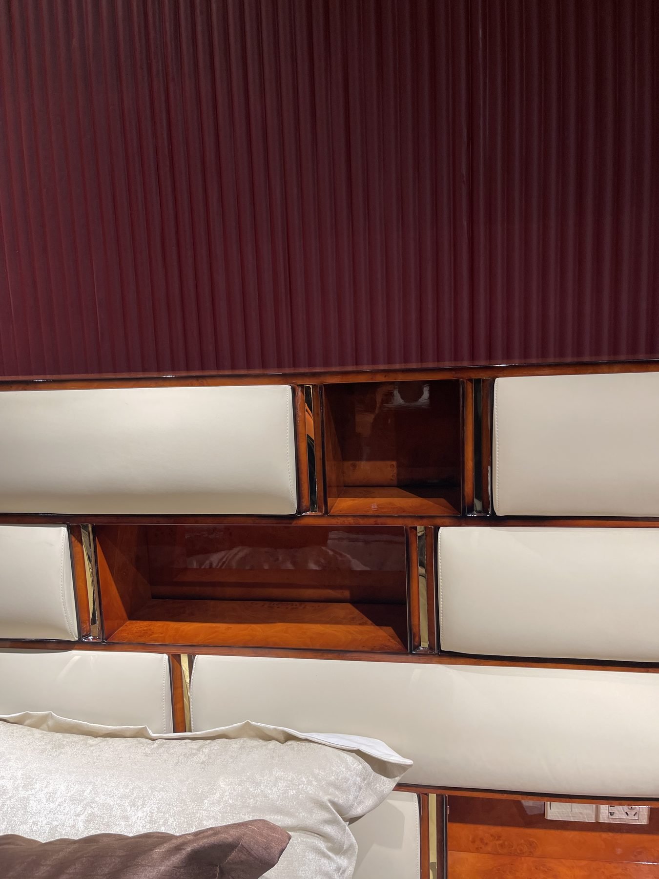 Modern bed design in a Foshan furniture showroom